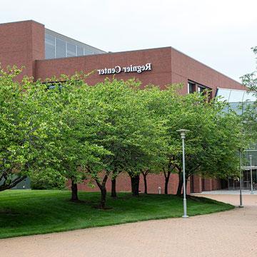 Exterior of the Regnier Center, with a courtyard in the foreground